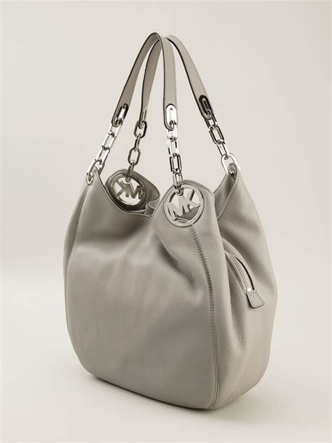 michael kors small purse grey|Michael Kors grey shoulder bag.